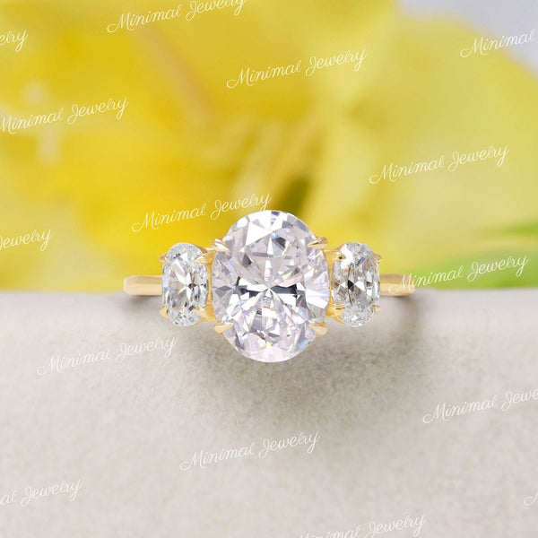 Oval Moissanite Three Stone Engagement Ring: 14k White Gold Trellis Setting