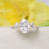 Oval Moissanite Three Stone Engagement Ring: 14k White Gold Trellis Setting